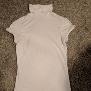 Ivory Turtleneck from Vanity